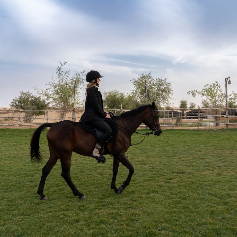 Sunset Horse Riding at Al Marmoom Oasis with a 6-Course Bedouin Dinner Al Qudra